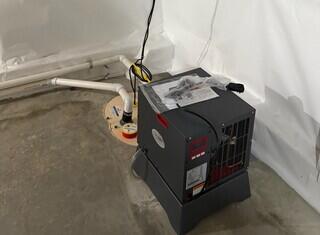 The SaniDry Sedona dehumidifier keeps the humidity in the basement low and drains itself into the sump pump. The TripleSafe sump pump takes all of the water it collects and sends it out of the home through the discharge lines.