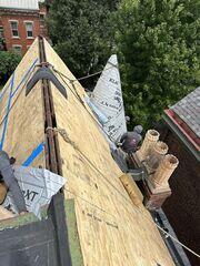 We wrapped the turret with our Ice & Water shield as well. Our Ice & Water shield has a gooey substance backing, which allows us to adhere it straight onto the framing. This substance helped create a waterproof seal when we installed the shingles over the top of it.
