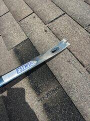 After we received the shingles the insurance company sent over, our Inspector then documented the process of the patch repair. He started with a flat bar to reduce the lift on the existing shingles when installing the patch.