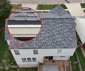 This photo shows the final transformation. We added a close up view of the new RainDrop gutter guards we installed as well. We also reworked the downspouts and ran a rain test to ensure the system was working properly.