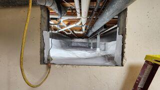 This photo shows the size of the crawl space. On top of stabilizing the floors, we also encapsulated the space with SilverGlo insulation and our CleanSpace vapor barrier, which will help the homeowners save on energy bills and prevent moisture.