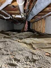 This was what the crawl space looked like before we started the project. The floor joists were sinking to the right side of this picture.