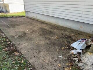 This backyard patio in Newark, DE had sunk nearly 6 inches, leaving the surface uneven, cracked, and unsafe for use.