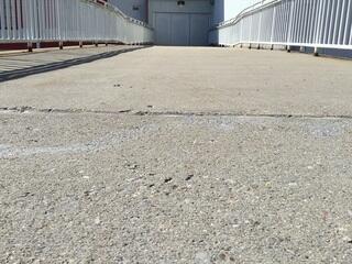 Now that the ramp is even again, the workers can get back to business as usual.