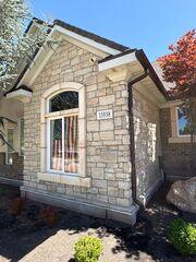 Brown Gutters Add Rich Contrast to a Draper Home