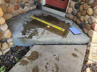 A close up of the step at the front walkway