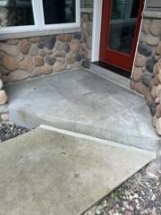 After our crew lifted the slabs and sealed the joint