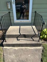 After our crew lifted the slabs and sealed the crack.
