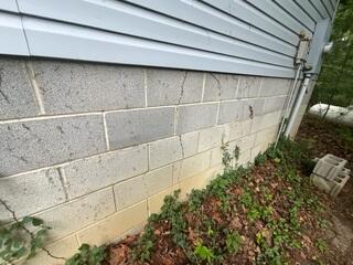 Cracks along Cinderblock Foundation walls