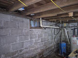 Before - Bowing Cinder Block Foundation Wall