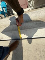 A close up to see how far the slabs have sunken by the steps