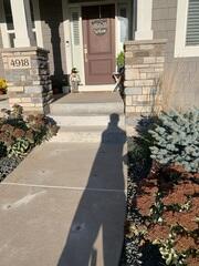 After our crew lifted the slabs and sealed the joints of the sidewalk