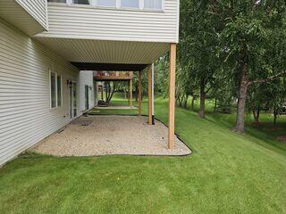 Before: Our Design Specialist, Eric, recommended securing the deck with Helical Piers.