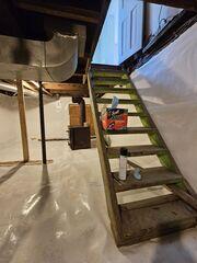 Drainage Matting: Placed beneath the CleanSpace liner to help channel water toward the sump pump, preventing seepage beneath the liner from becoming a problem. CleanSpace® Crawl Space Encapsulation System: A durable, 20-mil vapor barrier was installed over the entire crawl space floor and walls. This bright white liner completely seals out ground moisture, creates a clean, finished look, and channels any seepage toward the sump system.