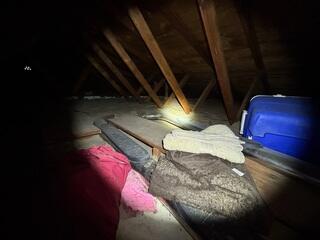 Before this attic was messy and under-insulated.