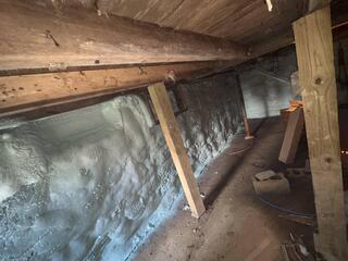 Spray Foam Insulation on Stack Stone Foundation