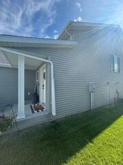 Before our radon mitigation system was installed outside of the home.