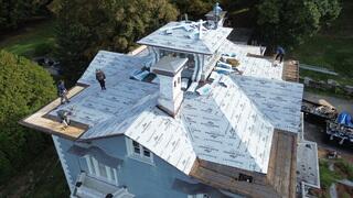 Before installing any new roofing materials, we fully covered the roof with the high-performance SealoronXT Ice & Water Shield. This protective layer acts as a waterproof barrier across the entire surface, sealing around nails and preventing any future leaks. It's an essential step in creating a watertight system. All areas where shingles will be are covered with the shield; the remaining spots will be the flat roof system.