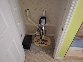 We installed our most secure sump pump system in the closet. The TripleSafe sump pump comes with a battery backup system in case the power goes out. It is also super quiet, has an airtight lid, and an alarm system. This basement is now ready for some carpet.