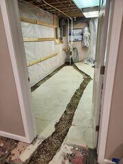 During: Our Foreman, Lane, and his crew secured WaterGuard throughout the basement.