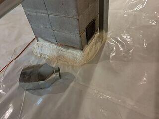 CleanSpace® Encapsulation System: A durable, 20-mil reinforced vapor barrier was installed across the entire floor and walls, sealing out ground moisture and humidity. The bright white liner instantly improved the space's appearance and usability.

Closed-Cell Spray Foam Insulation: Applied to crawl space walls, the foam provides insulation and an additional moisture barrier, helping regulate temperature and reduce energy loss.