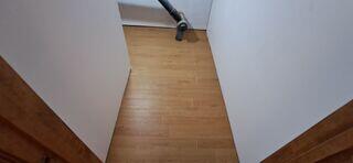 ThermalDry® Elite Plank Flooring System: Once the basement was fully waterproofed, the team installed Basement Systems' exclusive Elite Plank flooring - a durable, waterproof, and attractive wood-look plank designed specifically for finished basements. Unlike traditional flooring, it will never warp, buckle, or support mold growth, even in high humidity.