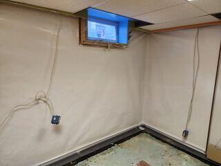 During: Our Foreman, Arturo, and his crew worked hard to install the waterproofing products throughout the basement.
