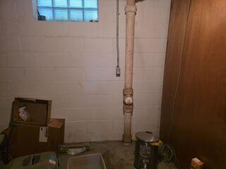 Before: Our Design Specialist, Darin, recommended waterproofing the entire basement.