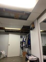 The original drop ceiling was aged and damaged, with several cracked and missing tiles throughout the basement. The ceiling grid showed wear, and the space felt dark and unfinished - in need of an update to restore a clean, cohesive look.