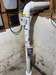 The PVC pipe installed into the footing of the home