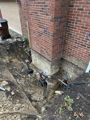 This photo shows the base of the chimney with the piers supporting beneath.