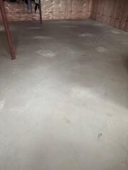 The entire basement slab has been successfully lifted, stabilized, and leveled. The injection points have been patched, and the floor is now safe