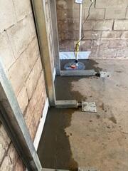 This was what the wall looked like after we straightened it back onto the footing. Head on over to the next set of photos to see a closer up.