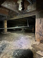 With no barrier in place, this crawl space just had exposed dirt that allowed moisture and humidity into the home.