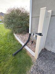 Ten Downspouts and a Fresh Gutter System Transform a Saratoga Springs Home