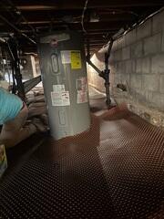 During: Our Foreman, Arturo, and his crew succesfully installed all the products throughout the crawl space.