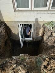 After we cut the wall out with a very large concrete saw, we then fitted the opening with the 35x54 window.