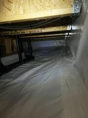 Our crew installed our 20 mil-thick-liner, CleanSpace. This will help protect and brighten the crawl space.