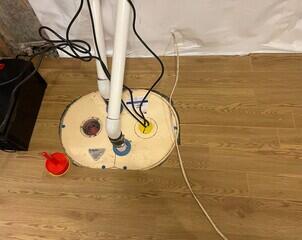 The TripleSafe sump pump sends all of the collected water out of the home through the two discharge lines.