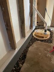 During: Our Foreman, Franklin, and his crew secured the WaterGuard and TripleSafe in the corner of the basement.