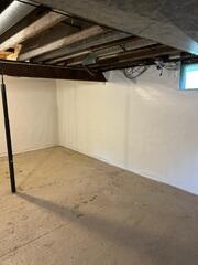 During: The crew successfully secured CleanSpace on the basement walls.