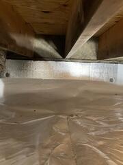 CleanSpace was installed on the walls to keep the moisture and humidity from the walls and floors from filtering into the crawl space and weakening the supports and creating an unstable environment.
