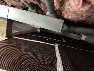 Drainage Matting was placed across the crawl space floor to create a stable, raised surface that directs groundwater toward the drainage system. This prevents water from pooling beneath the home and ensures that moisture flows efficiently to the proper exit points.