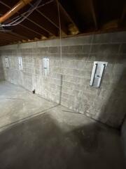 During: Our Design Specialist, Dylan, recommended installing GeoLock Wall Anchors along the basement walls.