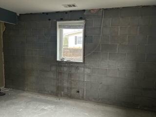 Before: Our Design Specialist, Mac, recommended waterproofing the entire space.