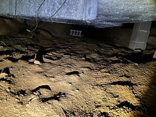 This was what the crawl space looked like before we started the project. You can see that the ducts were dripping condensation. Condensation can cause ducts to rust.