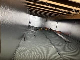 Our SilverGlo Insulation Panels were applied to the crawl space walls to provide a superior thermal barrier. These durable, rigid panels significantly boost energy efficiency and serve as an additional, permanent moisture barrier, keeping the crawl space dry and temperature-stable.