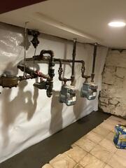 We installed our WaterGuard Drainage System to capture water at its entry point along the basement's perimeter and direct it safely away, preventing future seepage and protecting the foundation from ongoing moisture issues.