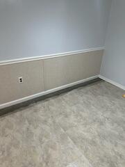 Our EverLast Wall Panels were installed to replace water-damaged surfaces with a clean, durable, and moisture-resistant finish.