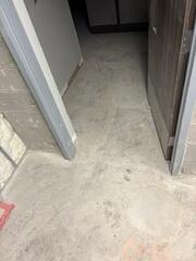 Uneven concrete in a busy hallway area showed clear signs of slab settling and voids forming beneath the surface.